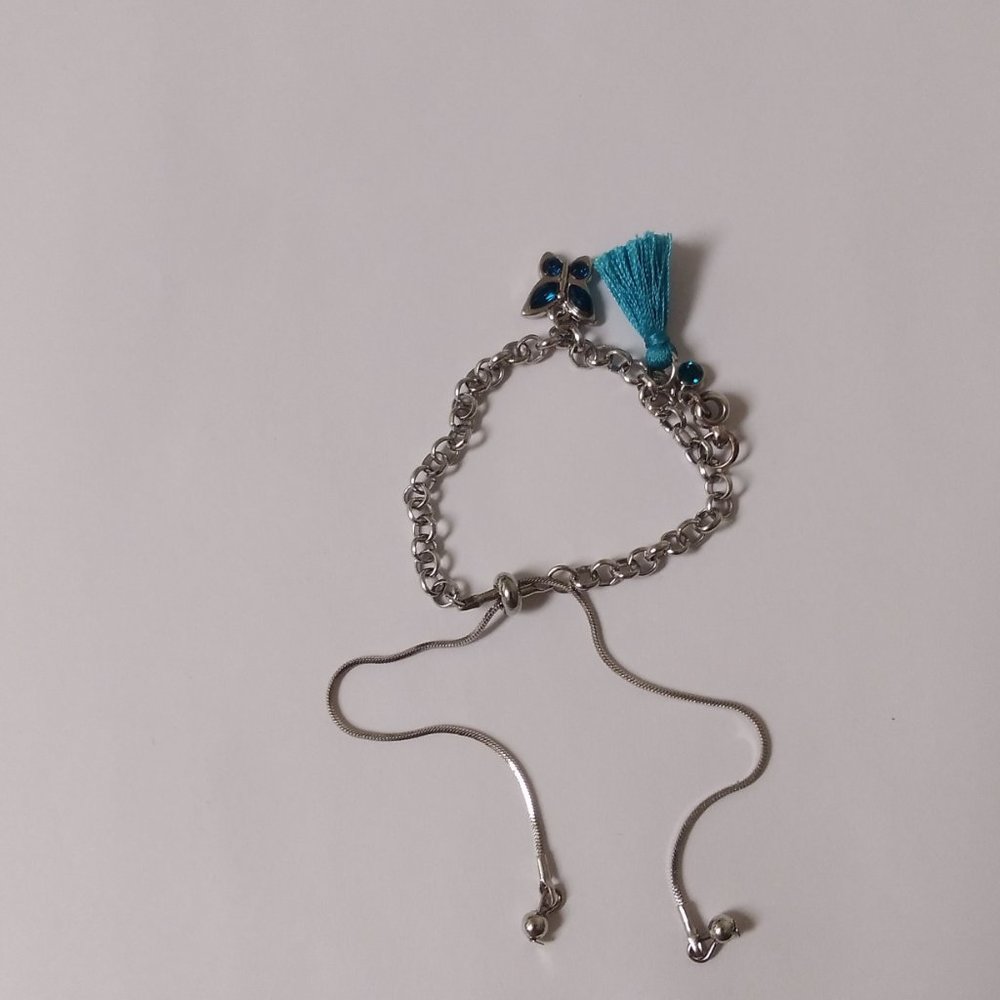 Silver chain, and dark blue tassel, butterfly and gem homemade bracelet💙